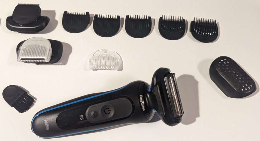 Braun 5150cs shaver with the beard trimmer attachment and combs, plus the body groomer attachment and combs