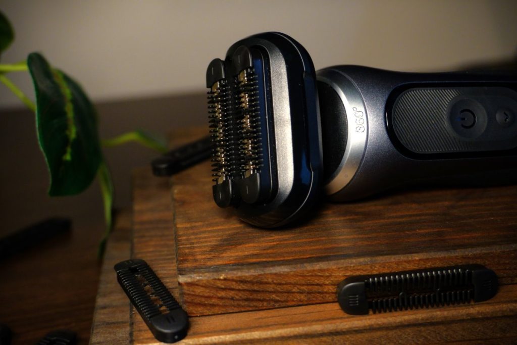 Close up of a Braun Series 7 shaver with the beard stubble attachment