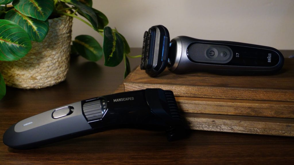 The Beard Hedger from Manscaped resting next to a Braun Series 7 shaver