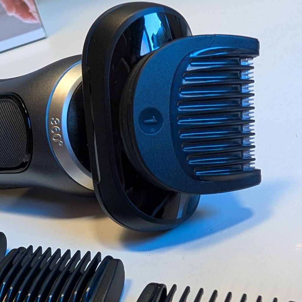 close up front view of the Braun Series 7 with the beard trimmer attachment