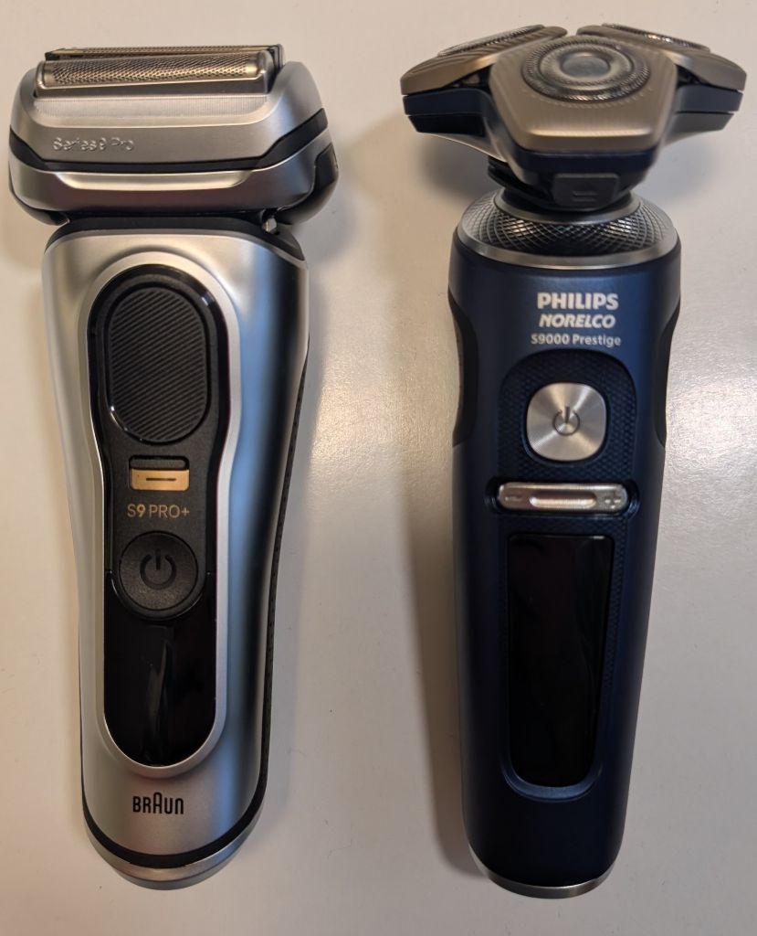 Side by Side view of 2 shavers, Braun Series 9 Pro+ and Philips Norelco S9000 Prestige Space Grade